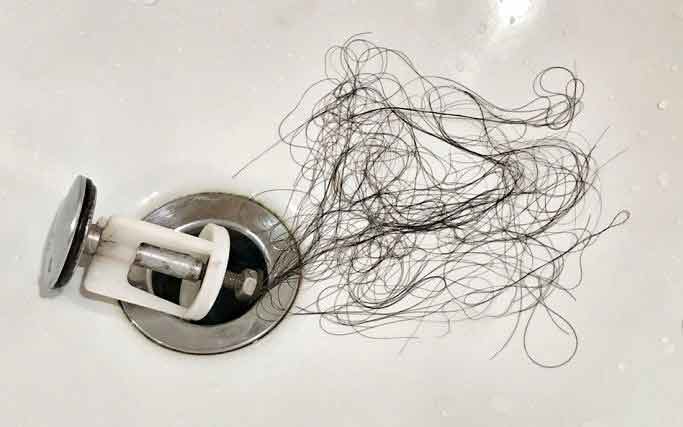 how to remove hair from clogged bathtub drain